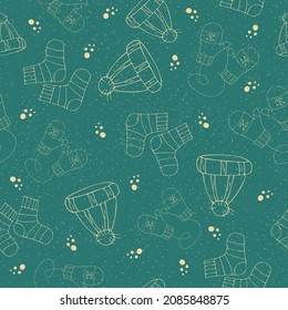 Vector Seamless pattern with doodle winter clothing hats, socks, mittens. New year, christmas pattern