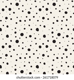 Vector seamless pattern with dotted circles. Stylish background with randomly disposed spots. Monochrome minimalist graphic design. Tileable simple texture from small black dots