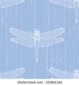 Vector seamless pattern with dragonfly white silhouettes on a blue striped background