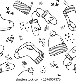 Vector seamless pattern drawn doodle  knitted socks, mittens and hats. Background for textiles, cards, stationery, sites, your work.