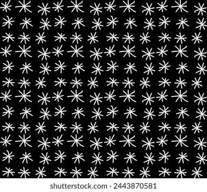 Vector seamless pattern drawn in doodle style in the form of white snowflakes on a black background