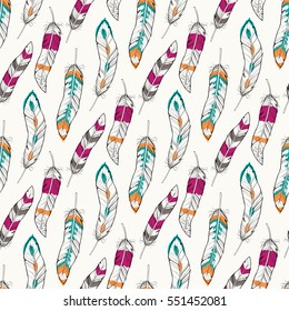 Vector seamless pattern with ethnic colorful feathers. Boho style
