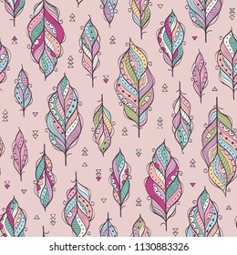 Vector seamless pattern with ethnic feathers. Colorful ethnic background.