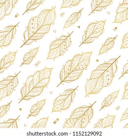 Vector seamless pattern with ethnic feathers in golden color. Boho style background