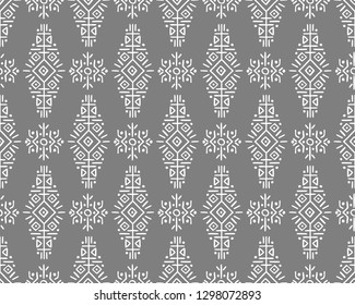 Vector Seamless Pattern in Ethnic Style. Trendy hand drawn boho tile. Creative tribal endless ornament, perfect for textile design, wrapping paper, wallpaper or site background.