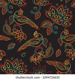 Vector seamless pattern in ethnic style.Exotic birds, colorful contour thin line fantasy flowers with folk ornaments on a black background. Embroidery, wallpaper, textile print, wrapping paper