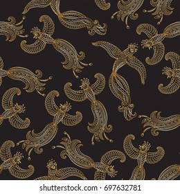 Patrón sin fisuras de Vector en estilo étnico. Pájaros voladores exóticos, dibujo de línea delgada de contorno dorado con adornos populares sobre un fondo negro. Silueta del bordado, Fondo de pantalla, impresión textil, papel de embalaje