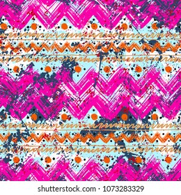 Vector seamless pattern with ethnic and tribal motifs in romantic pink colors. Bold bohemian texture with hand drawn chevrons, brushed lines, watercolor splatters and dots. Print in boho chic style