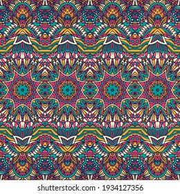 Vector seamless pattern ethnic tribal floral psychedelic colorful fabric print. Ethnic tribal brihgt aztec indians ornaments.