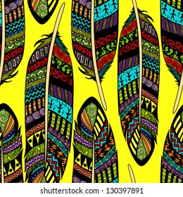 Vector seamless pattern with etno ornate colorful feathers