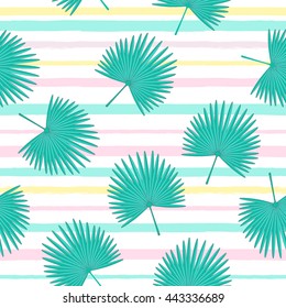 Vector seamless pattern with fan palm leaves . Tropical cute background with stripes. Textile fabric print
