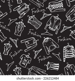 Vector seamless pattern with fashionable clothes in black and white style. Background for use in design, web site, packing, textile, fabric