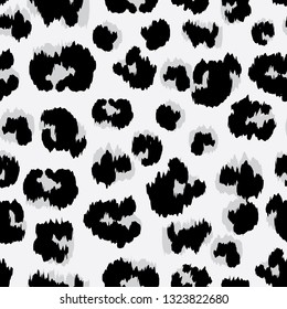 Vector of seamless pattern with faux leopard skin colored with black and white. Animal repeat surface pattern. Design for textile, fabric, decoration, wallpaper, wrapping, scrapbook, or packaging