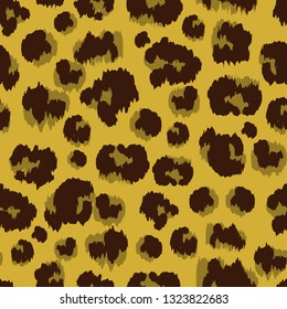 Vector of seamless pattern with faux leopard skin colored with black and brown. Animal repeat surface pattern. Design for textile, fabric, decoration, wallpaper, wrapping, scrapbook, or packaging
