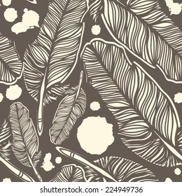 Vector seamless pattern of feathers.