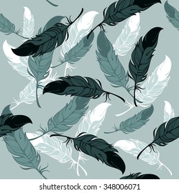 Vector seamless pattern with feathers of birds for the production of fabrics 