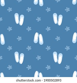 vector seamless pattern featuring ballet flat shoes and flowers in blue