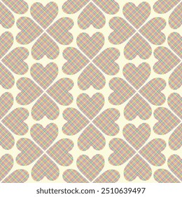 Vector seamless pattern featuring hearts with a vibrant plaid texture, arranged in a playful, geometric design. Perfect for fabric, gift wrap, or home decor projects that need a touch of whimsy and