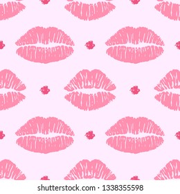 Vector seamless pattern with female pink lipstick kiss and polka dot. 