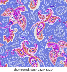 Vector seamless pattern. Firebirds and floral elements in Paisley style. 