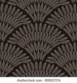 Vector seamless pattern with fish scale layout. Fan of a peacock tail shape from bronze brown bird feather silhouette on a black background 