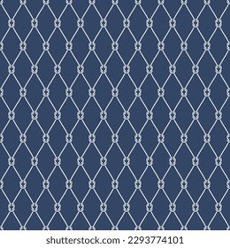Vector seamless pattern. Fishnet mesh from geometric loops on a dark indigo blue background 