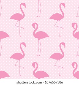 Vector seamless pattern with flamingo silhouettes on pink polka dots background