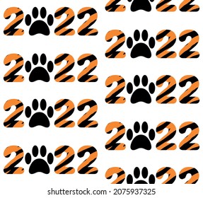 Vector seamless pattern of flat 2022 new year text with tiger paw and fur print isolated on white background