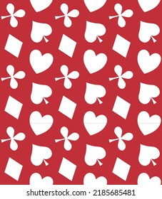 Vector seamless pattern of flat cards suits signs isolated on red background