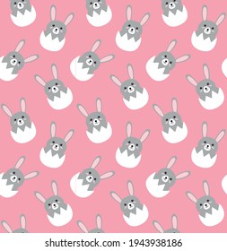 Vector seamless pattern of flat hand drawn doodle easter rabbit in egg shell isolated on pink background