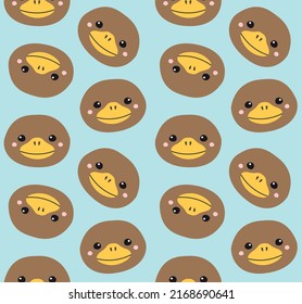 Vector seamless pattern of flat hand drawn platypus duckbill face head isolated on blue background