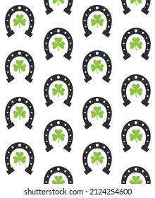 Vector seamless pattern of flat horse shoe with trefoil isolated on white background