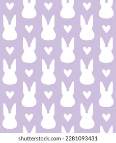 Vector seamless pattern of flat rabbit bunny face and hearts isolated on lilac background