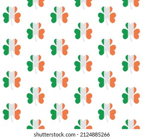 Vector seamless pattern of flat trefoil with Ireland flag isolated on white background