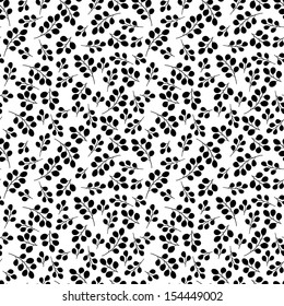Vector seamless pattern. Floral stylish background with randomly scattered branches.