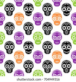 Vector seamless pattern with floral sugar skulls in black, purple, orange and green colors for Halloween designs