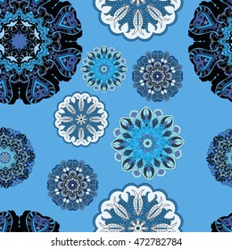 Vector seamless pattern with flowery mandalas print made in oriental style.