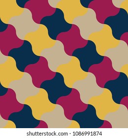Vector seamless pattern in the form of a large number of a shuriken star mixed by colors -red, yellow, blue and white.