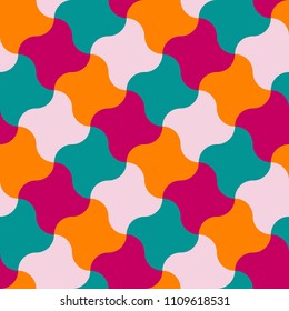 Vector seamless pattern in the form of a large number of a shuriken star mixed by vintage colors - orange, green, white, pink. Retro style.