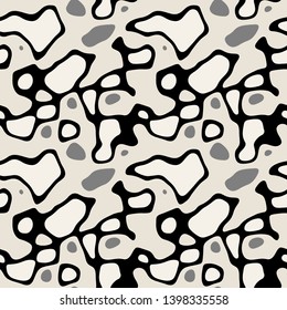 Vector seamless pattern. Free form organic shapes. Stylish structure of natural spots. Hand drawn abstract background. Can be used as swatch in Illustrator. Camouflage spotty print.