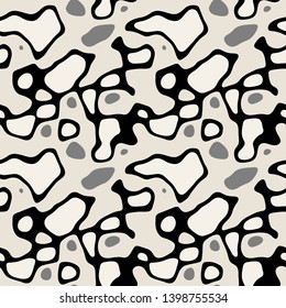 Vector seamless pattern. Free form organic shapes. Stylish structure of natural spots. Hand drawn abstract background. Can be used as swatch in Illustrator. Camouflage spotty print. Shades of grey.