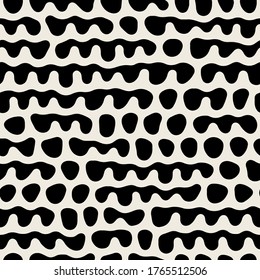 Vector seamless pattern. Free form organic shapes. Stylish structure of natural spots. Hand drawn abstract background. Can be used as swatch in Illustrator. Monochrome spotty print.