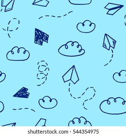 Vector seamless pattern with freehand drawn cartoon paper planes and clouds on blue background