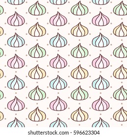 Vector seamless pattern with freehand drawn cartoon varicolored meringues on beige background with polka dot
