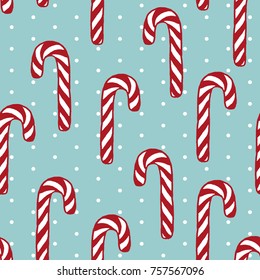 Vector seamless pattern with freehand drawn cartoon sugar candies on blue background with polka dots