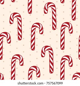 Vector seamless pattern with freehand drawn cartoon sugar candies on beige background with polka dots