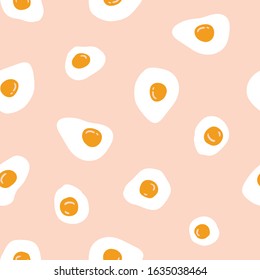 Vector seamless pattern with fried eggs on the pink background. Hand drawn fabric design. Food illustration.