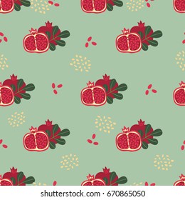 Vector seamless pattern with fruits and leaves of a red pomegranate.

