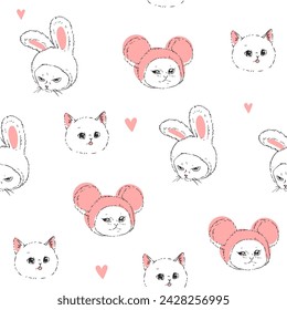 Vector seamless pattern with funny cat faces isolated on white. Hand-drawn texture with cute kittens for textile or wrapping design