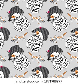 Vector seamless pattern with funny cats faces. Hand drawn illustration of funny tomcats with hats. Text. My sweet cat.